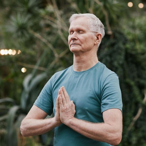 Man meditating after a workout, showing focus and inner peace.
